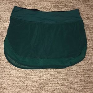 Lululemon dark green tennis skirt with mesh trim